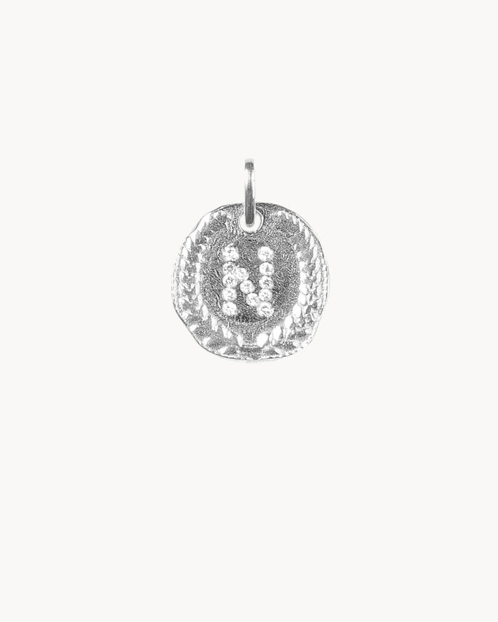 Silver medallion Letter N